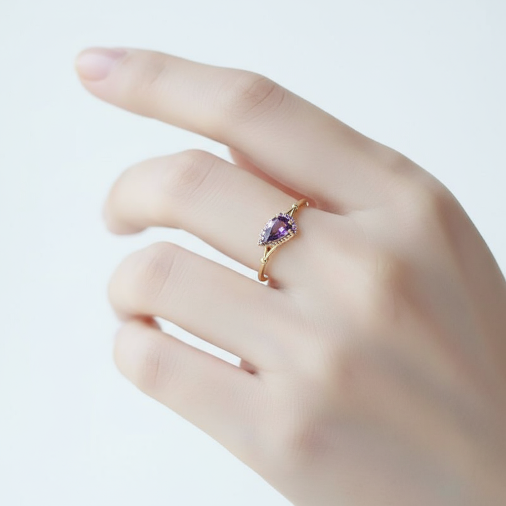 dainty gold plated 925 sterling silver ring with inlaid water drop shaped purple zirconia dainty gold plated 925 sterling silver ring with inlaid water drop shaped purple zirconia