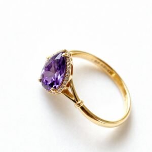 dainty gold plated 925 sterling silver ring with inlaid water drop shaped purple zirconia