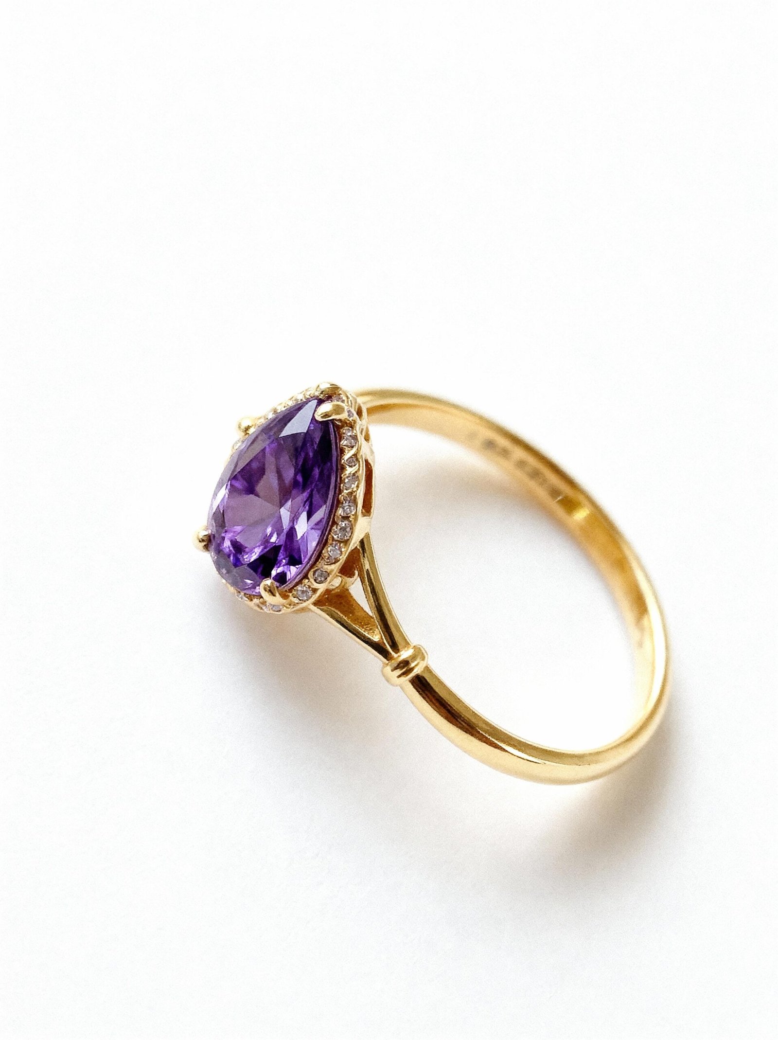 dainty gold plated 925 sterling silver ring with inlaid water drop shaped purple zirconia dainty gold plated 925 sterling silver ring with inlaid water drop shaped purple zirconia