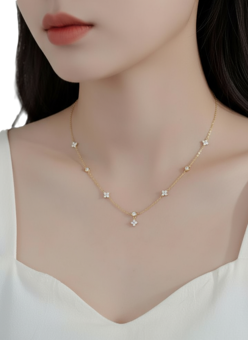 dainty gold plated 925 silver dangling flower & cubic zirconia station necklace dainty gold plated 925 silver dangling flower & cubic zirconia station necklace